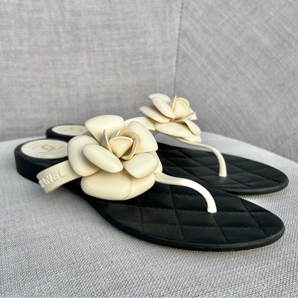 CHANEL Shoes - CHANEL Camellia Rubber Flat
Thong Sandals Flip Flops Black x
White